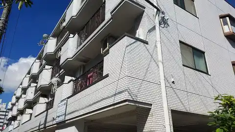 タウンコート丸義